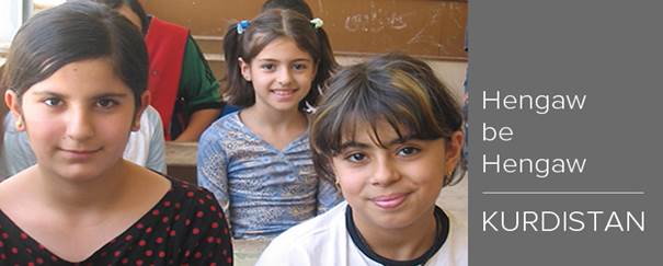 Three Kurdistan girls in class smiling